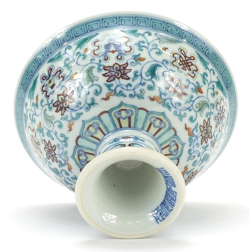 924 - Chinese doucai porcelain stem bowl hand painted with flowers and Daoist emblems, six figure characte... 