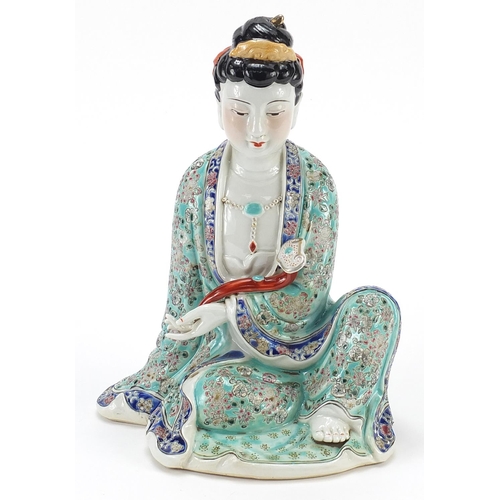 1020 - Chinese porcelain figure of Guanyin hand painted in the famille rose palette with flowers, impressed... 