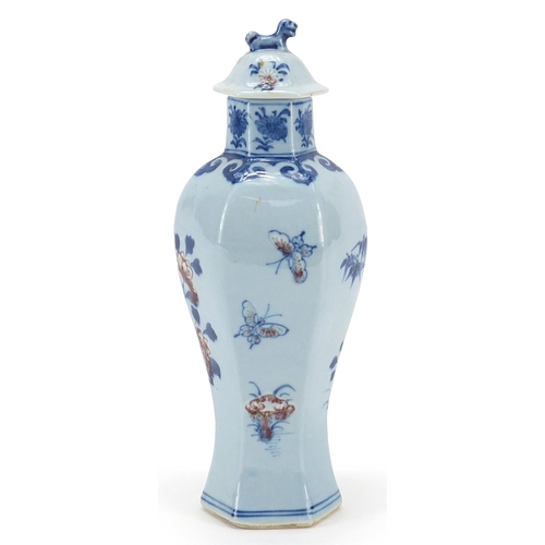 1022 - Chinese porcelain hexagonal vase and cover hand painted with flowers, four figure character marks to... 