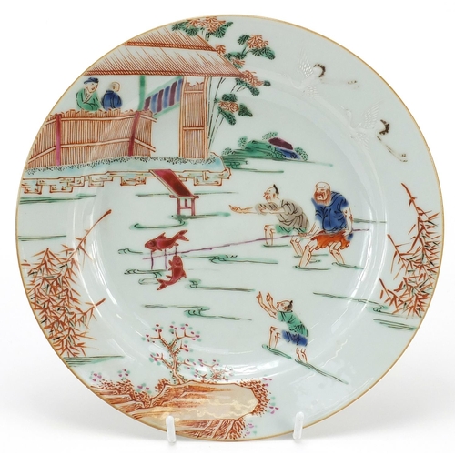 1055 - Chinese porcelain plate hand painted with a fisherman, 22.5cm in diameter