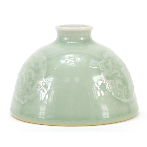 967 - Chinese porcelain beehive water pot having a celadon glaze, decorated in low relief with mythical an... 