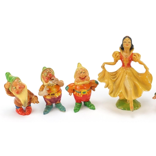 885 - Wade cellulose Snow White and the Seven Dwarfs, the largest 16.5cm high