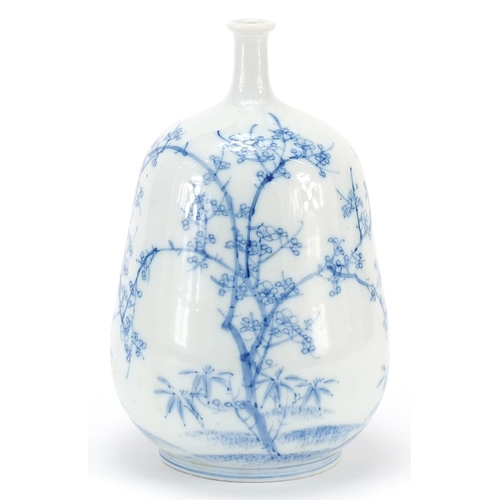 903 - Japanese blue and white porcelain vase hand painted with trees, 23.5cm high