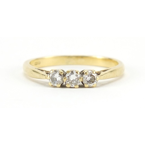 176 - 18ct gold diamond three stone ring, size L/M, 2.8g