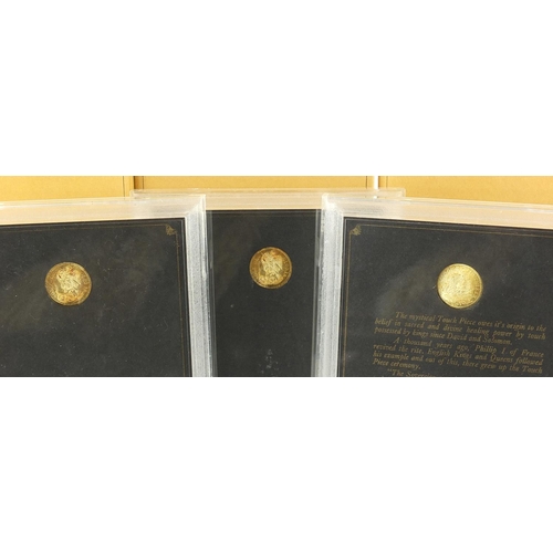 1110 - Three Charles II replica 18ct gold touch pieces with case