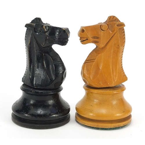 1029 - Staunton boxwood and ebony chess set with weighted bases and mahogany box, the largest pieces each 9... 