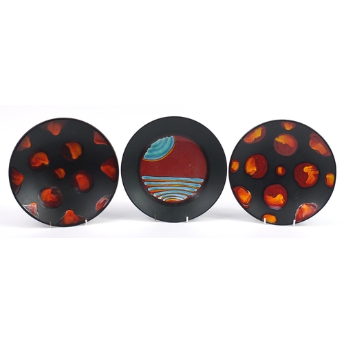 886 - Three Poole Pottery shallow bowls including two Galaxy pattern examples, each 26.5cm in diameter