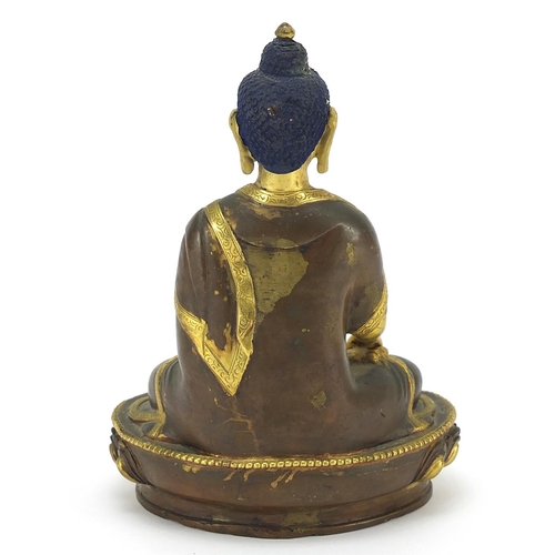 985 - Chino Tibetan gilt bronze figure of Buddha, 19cm high