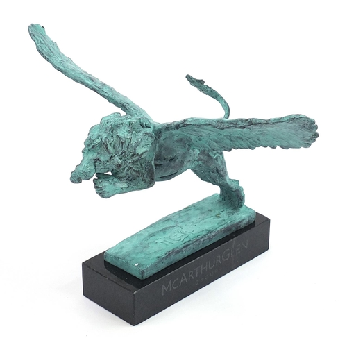 923 - Mark Coreth for McArthur Glen Group, verdigris bronze study of a winged lion raised on a rectangular... 