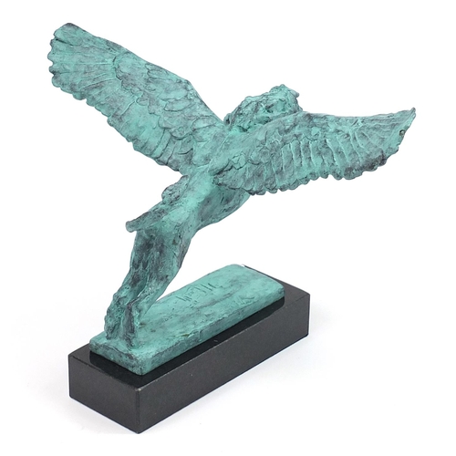 923 - Mark Coreth for McArthur Glen Group, verdigris bronze study of a winged lion raised on a rectangular... 