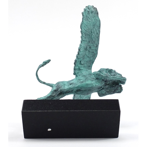 923 - Mark Coreth for McArthur Glen Group, verdigris bronze study of a winged lion raised on a rectangular... 