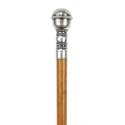 944 - Malacca walking stick with unmarked silver screw top handle, 90cm in length