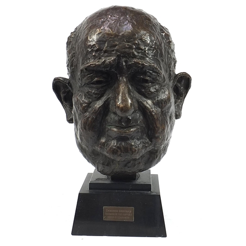 955 - Large patinated bronze head of Emmerich Grossman raised on a stepped black slate base, 46.5cm high