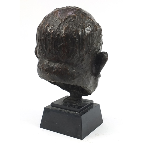 955 - Large patinated bronze head of Emmerich Grossman raised on a stepped black slate base, 46.5cm high