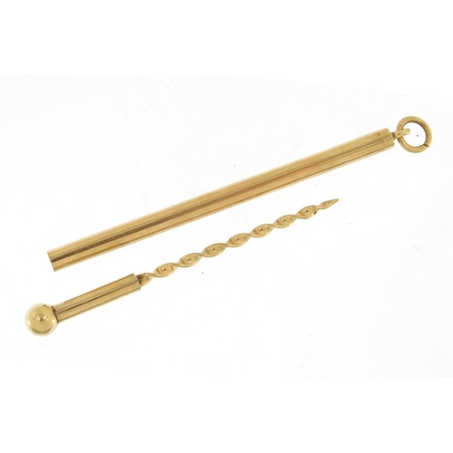 964 - 9ct gold cased toothpick, 5.5cm in length, 2.2g