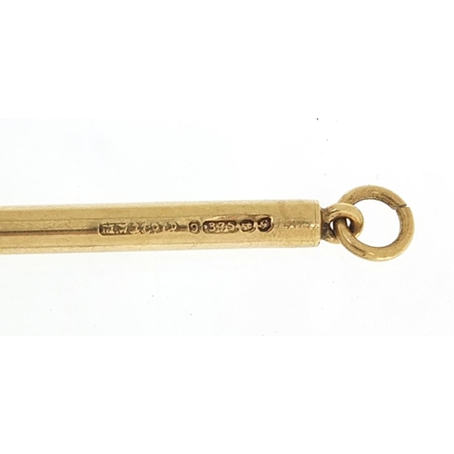 964 - 9ct gold cased toothpick, 5.5cm in length, 2.2g