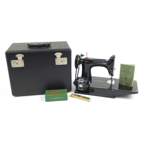 1008 - Victorian black enamel sewing machine with carry case, model 221K, the case 36cm wide