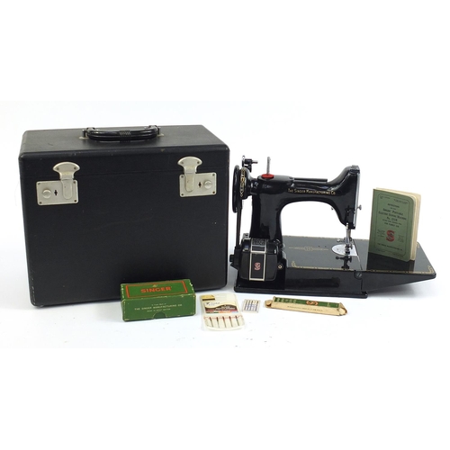 1007 - Victorian black enamel sewing machine with carry case, model 221K, the case 36cm wide