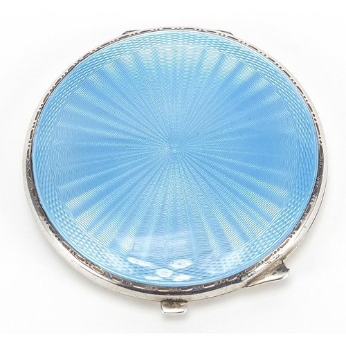 87 - Turner & Simpson Ltd, George VI silver and blue guilloche enamel compact, Birmingham 1951, 7cm in di... 