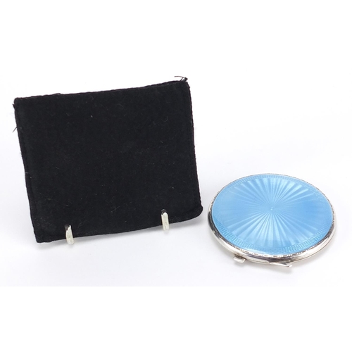 87 - Turner & Simpson Ltd, George VI silver and blue guilloche enamel compact, Birmingham 1951, 7cm in di... 