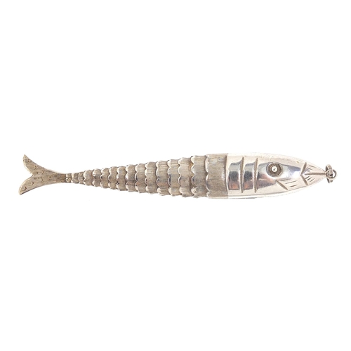 96 - Silver coloured metal articulated fish pendant marked 925 to the suspension loop, 11cm in length, 9.... 