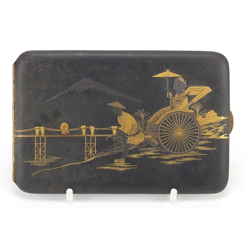 984 - Japanese damascene cigarette case decorated with a figure pulling a rickshaw before Mount Fuji, 12cm... 