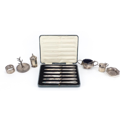 97 - Silver items including cruets, ring tree and set of six silver handled butter knives with steel blad... 