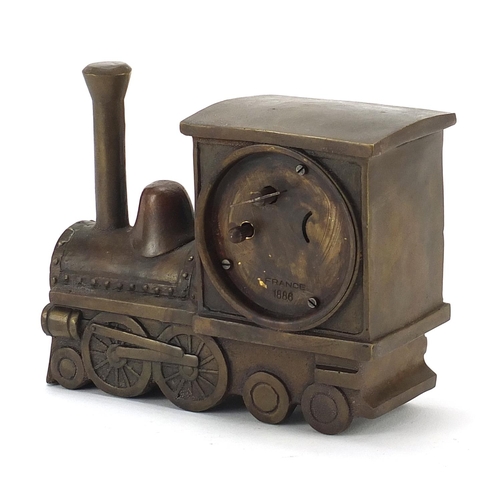 873 - Patinated bronze mantle clock in the form of a locomotive, 16cm in length