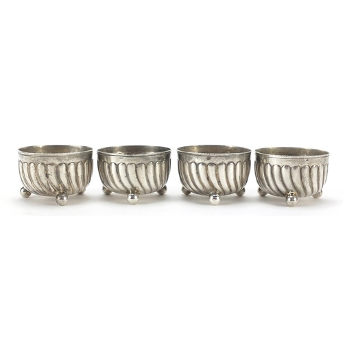 93 - Horace Woodward & Co, set of four Victorian silver open salts with ball feet, London 1890, 3cm high ... 