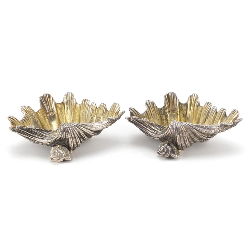 100 - Pair of heavy silver plated shell shaped salts, indistinct hallmarks, 12cm wide, 510.8g