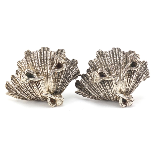 100 - Pair of heavy silver plated shell shaped salts, indistinct hallmarks, 12cm wide, 510.8g