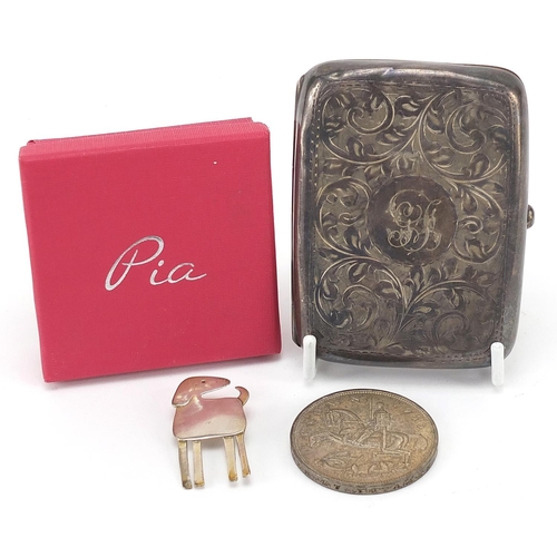 76 - Silver items comprising George V cigarette case, Modernist dog brooch by Pia with box and 1935 Rocki... 