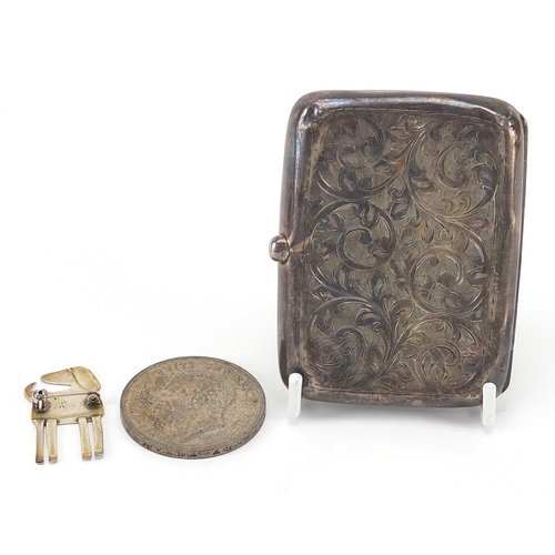 76 - Silver items comprising George V cigarette case, Modernist dog brooch by Pia with box and 1935 Rocki... 