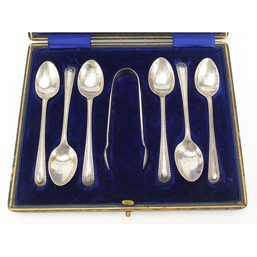 89 - Henry Williamson Ltd, set of six Edwardian silver teaspoons and sugar tongs housed in a fitted case,... 