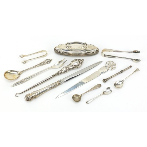 69 - Silver objects including a Maltese letter opener, mustard spoons and sugar tongs, various hallmarks,... 