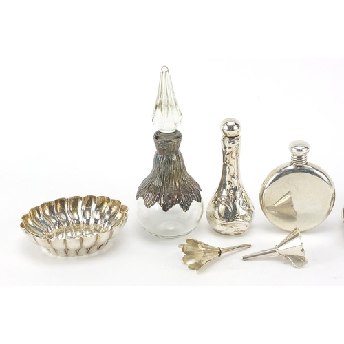 66 - Silver objects including scent bottles, funnels and pin dish, the largest 10.5cm high, weighable sil... 