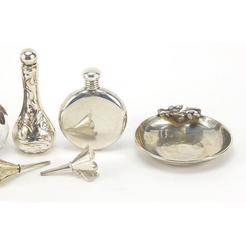 66 - Silver objects including scent bottles, funnels and pin dish, the largest 10.5cm high, weighable sil... 