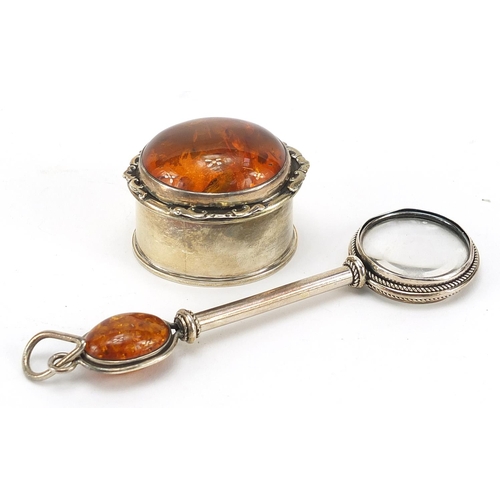 35 - Silver and amber trinket box and magnifying glass, the largest 13cm in length, total 78.5g