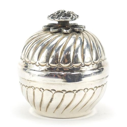 77 - Circular silver box and cover with rose head knop, stamped 900 to the interior, 6cm high, 81.6g