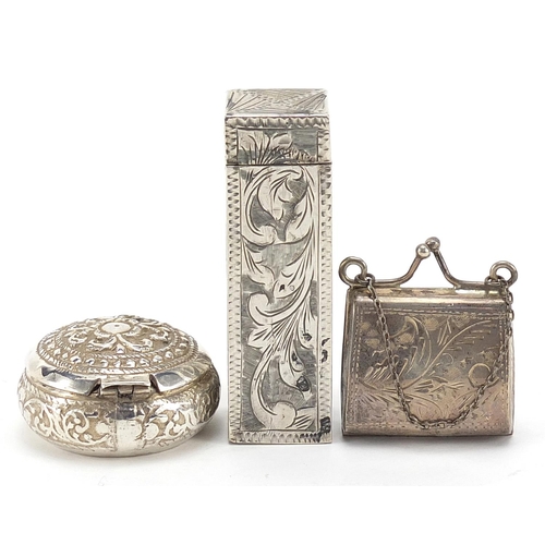 32 - Rectangular silver lipstick case with mirror and two silver pill boxes, the largest 5.5cm in length,... 