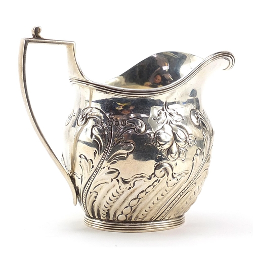 14 - F B Thomas & Co, Victorian silver cream jug embossed with fruit and foliage, London 1891, 10cm high,... 