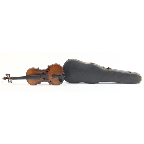 1014 - Old wooden violin with one piece back and case bearing a Joseph Guarnerius Fecit paper label dated 1... 