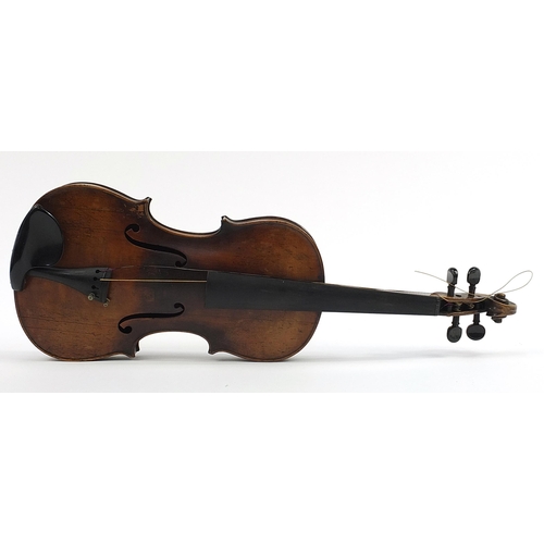 1014 - Old wooden violin with one piece back and case bearing a Joseph Guarnerius Fecit paper label dated 1... 