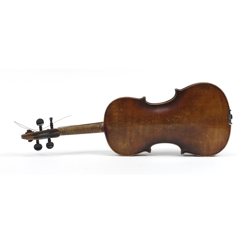 1014 - Old wooden violin with one piece back and case bearing a Joseph Guarnerius Fecit paper label dated 1... 