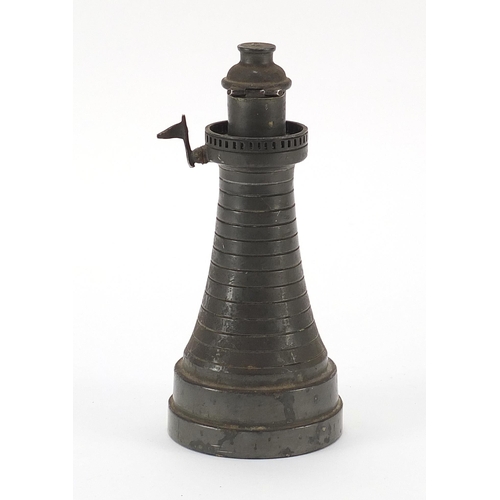 1011 - Vintage pewter table lighter in the form of a lighthouse, 14.5cm high