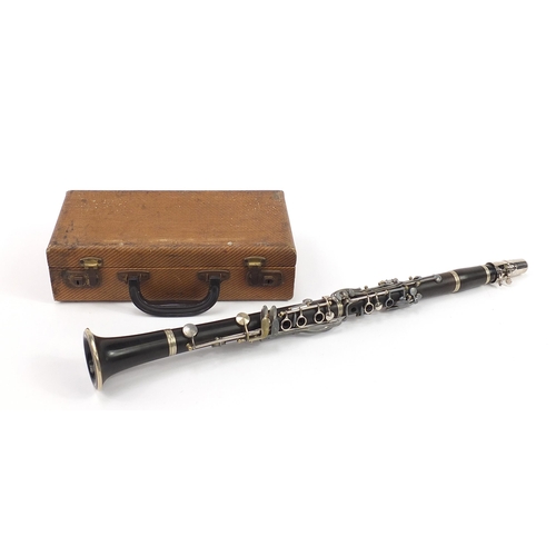 1016 - Vintage four piece clarinet housed in a fitted case