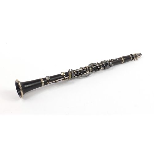 1016 - Vintage four piece clarinet housed in a fitted case