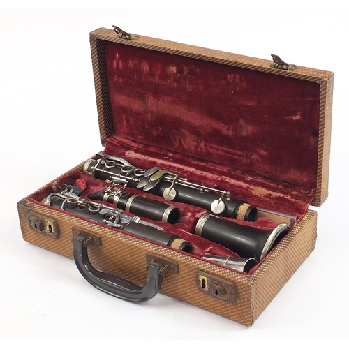 1016 - Vintage four piece clarinet housed in a fitted case