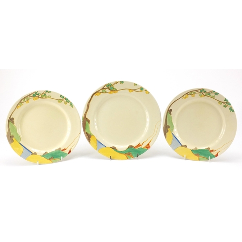 988 - Clarice Cliff, three Art Deco plates hand painted in the Seven Colour Sequence pattern, the largest ... 