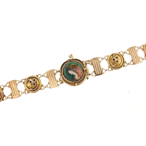 106 - Manner of Liberty & Co, Art Nouveau unmarked gold and enamel bracelet decorated with a female, tests... 